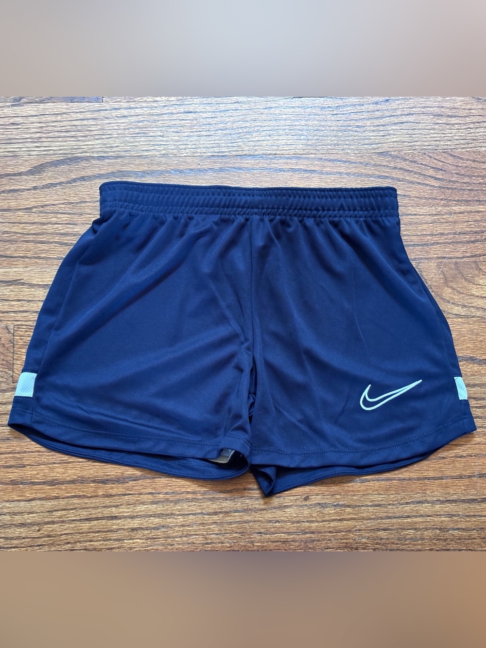 Nike kids Navy Dri-FIT Athletic Shorts. Navy Blue